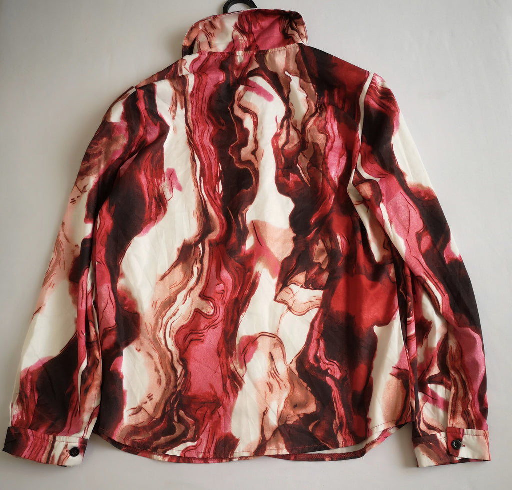 Blusa tipo seda