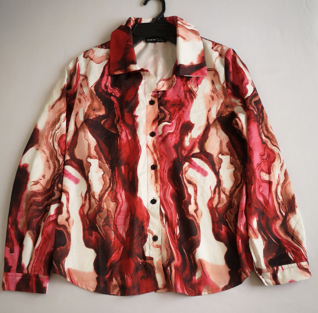 Blusa tipo seda