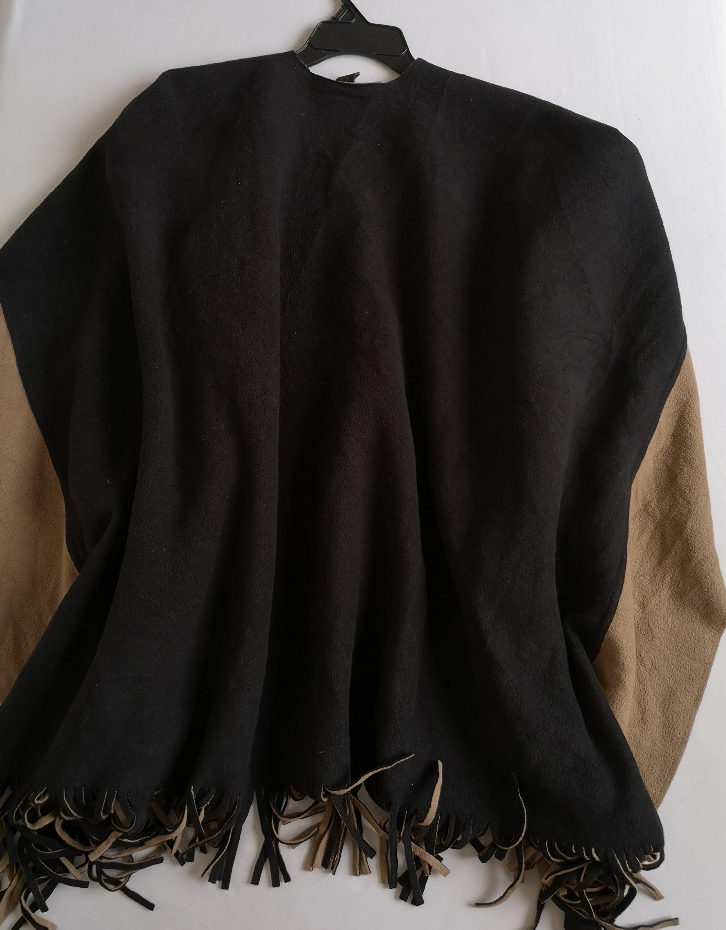 Poncho abierto de los lados