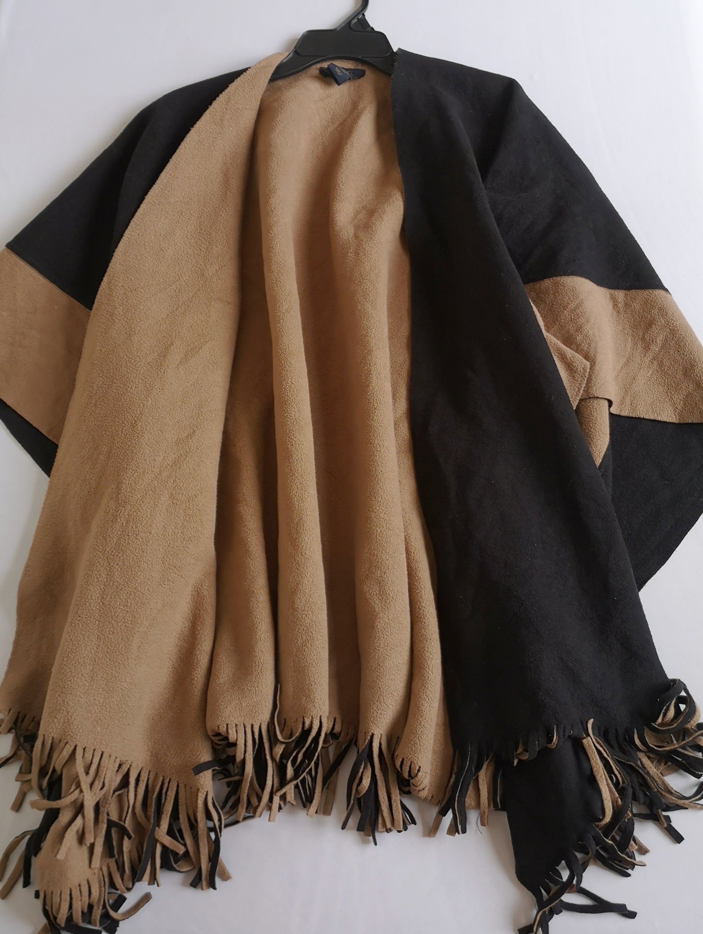 Poncho abierto de los lados