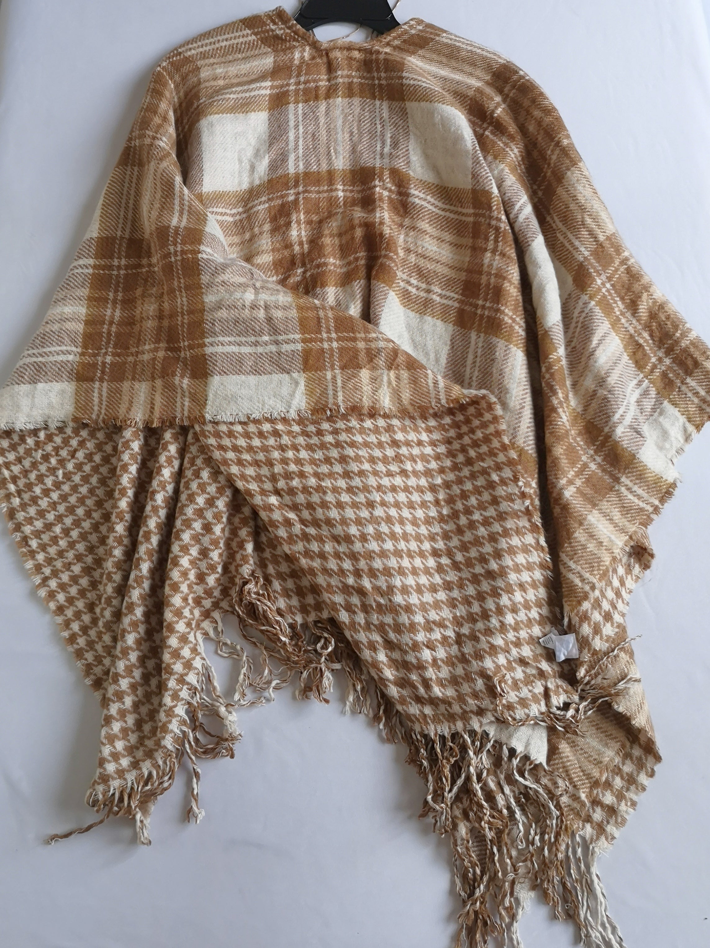 Poncho abierto de los lados