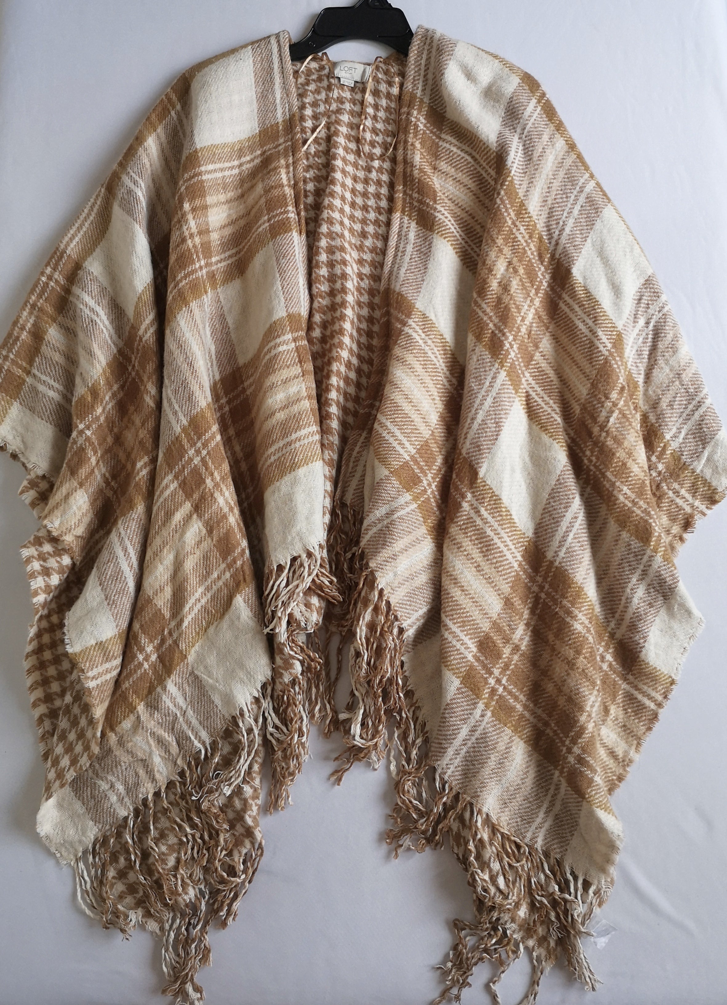 Poncho abierto de los lados