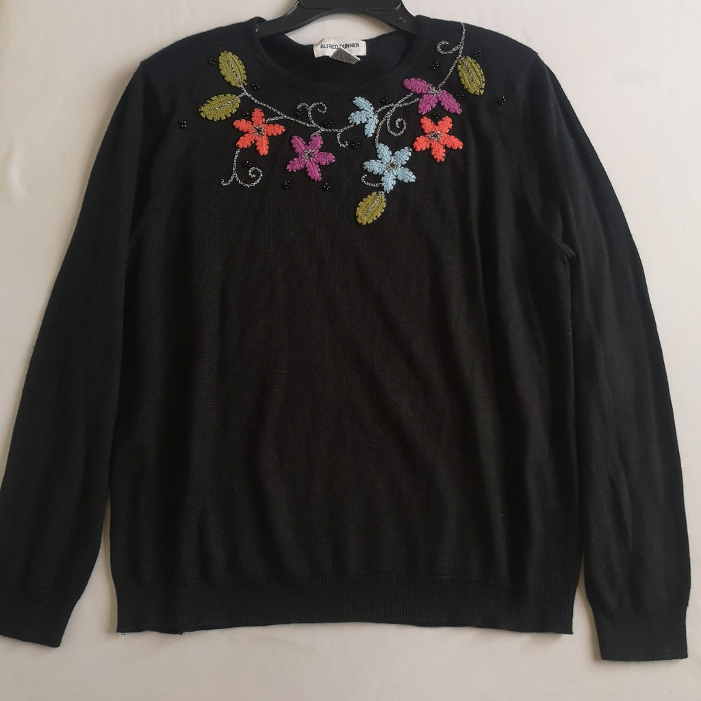 Sueter bordado con pantalón pixie