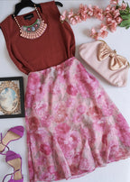 Blusa sin mangas con falda midi