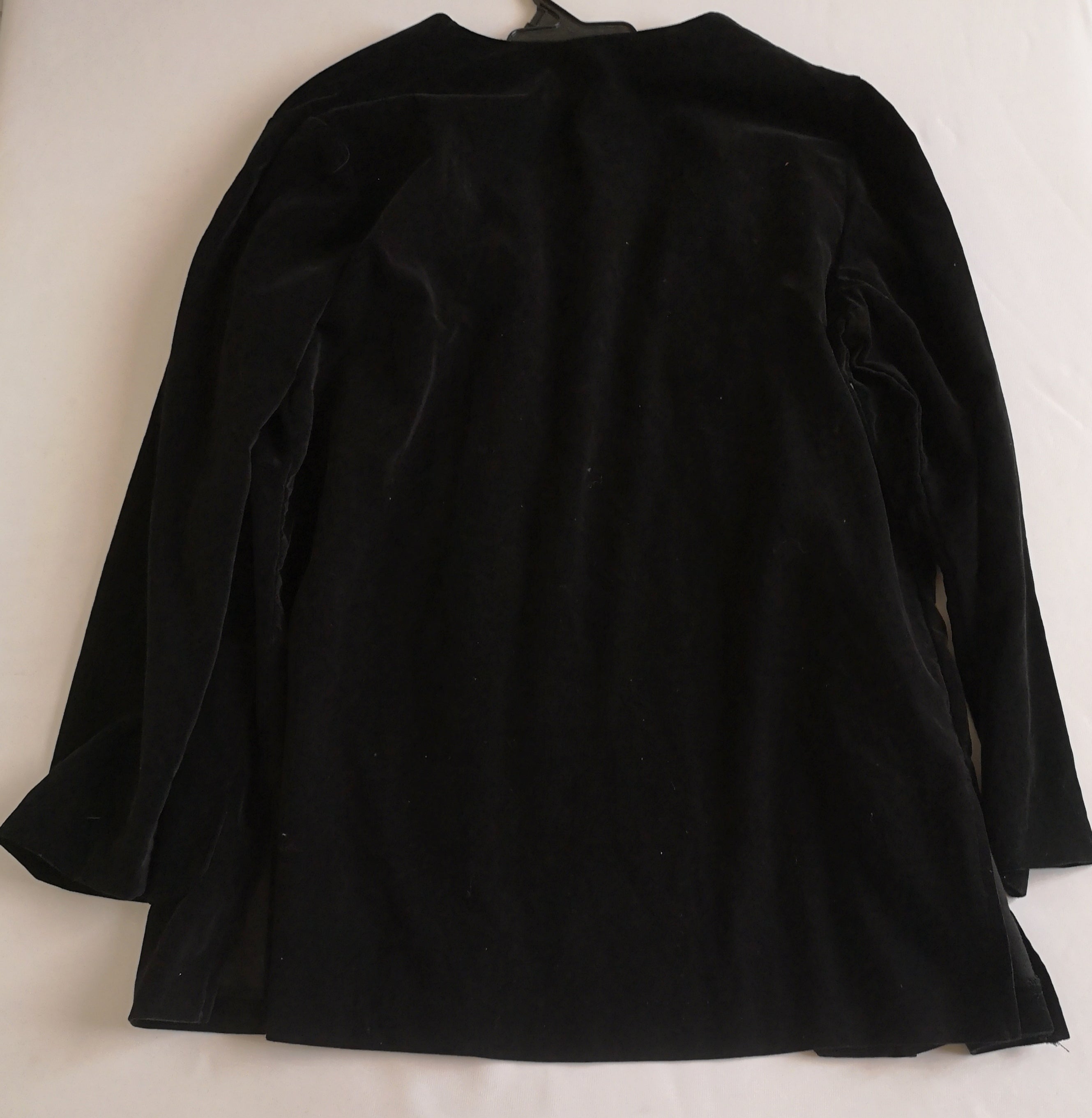 Blazer de terciopelo con bolsas adelante