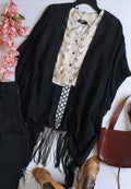 Blusa corta y kimono con flecos