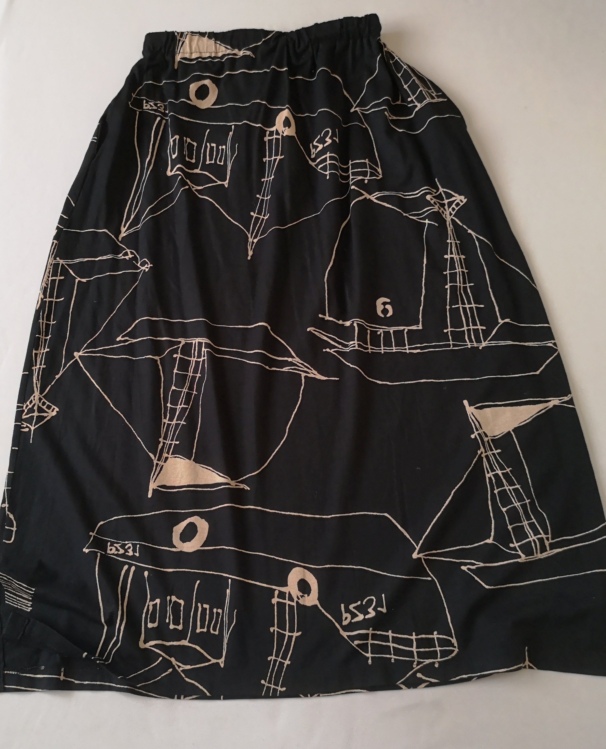 Falda con bolsas a los lados con sueter tejido