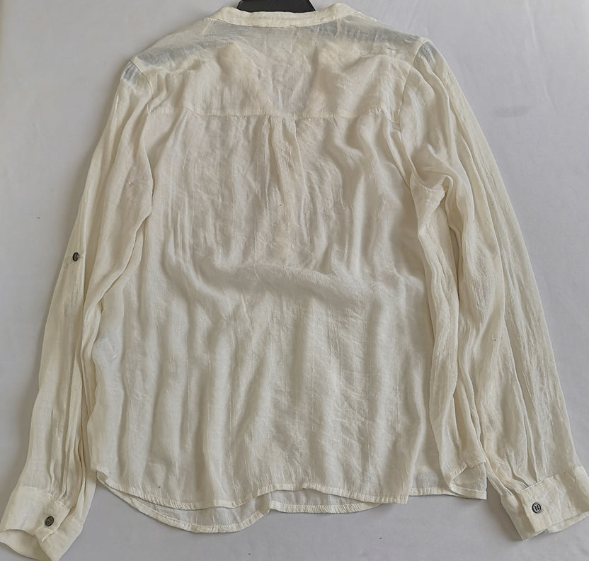 Palazzo con bolsas a los lados y blusa tela suave