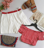 Blusa corta hombros descubiertos y short con bolsas