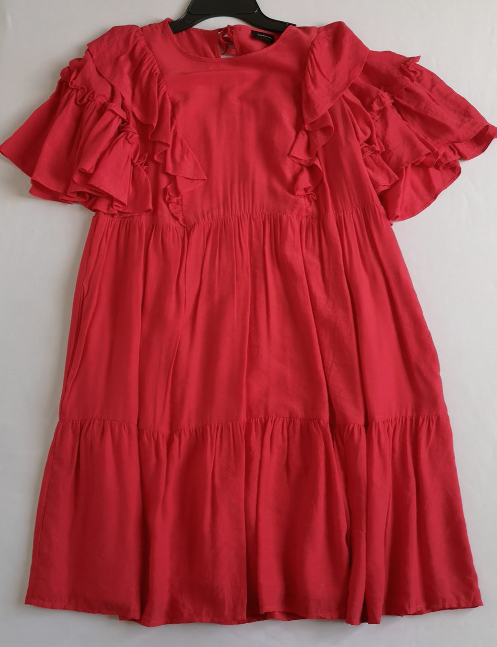Vestido con olanes y bolsas a los lados incluye cincho