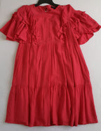 Vestido con olanes y bolsas a los lados incluye cincho