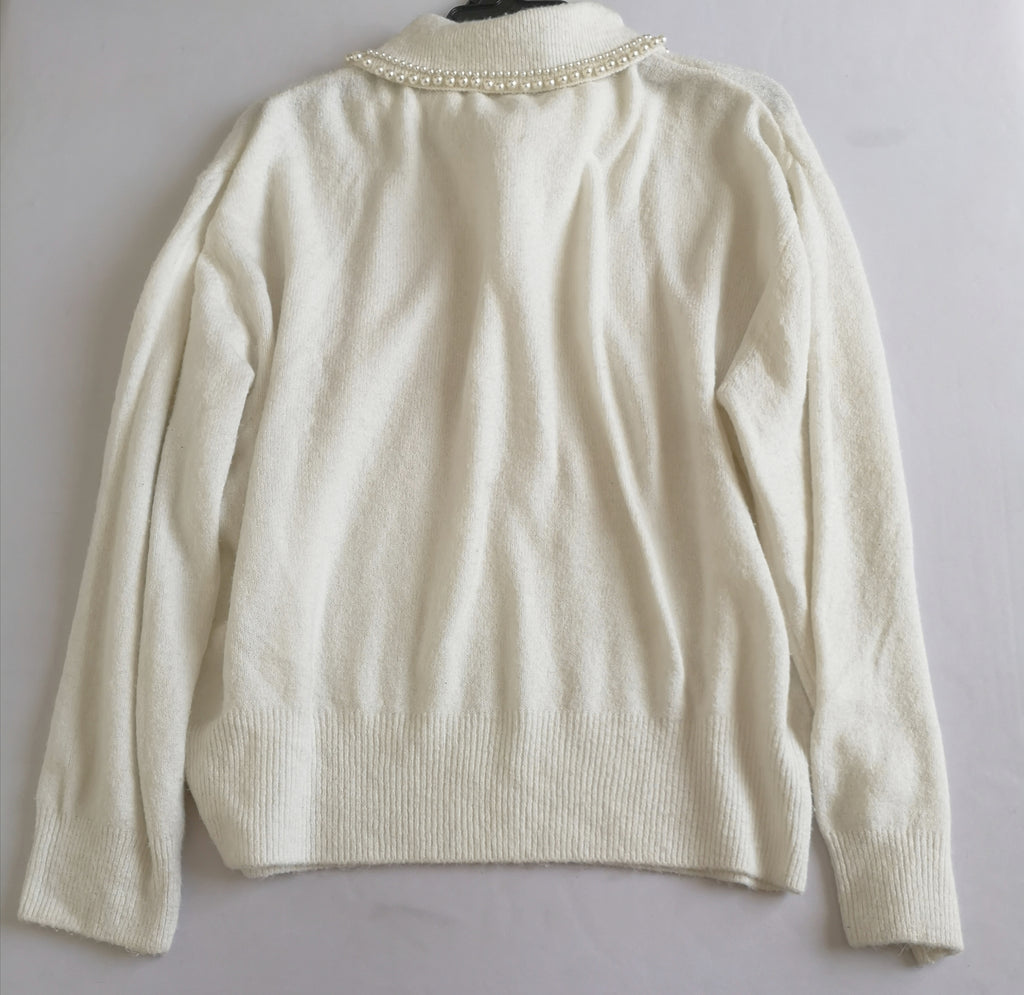 Sueter bordado del cuello