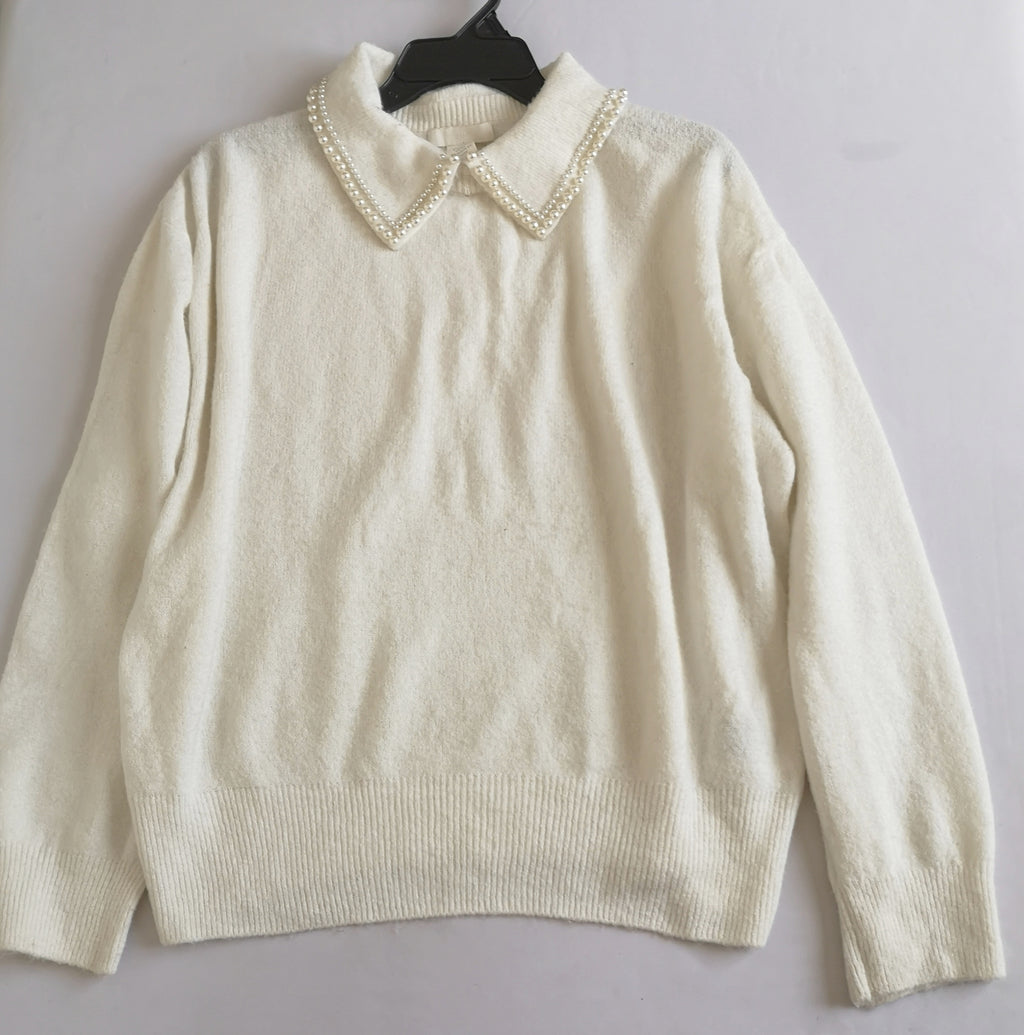 Sueter bordado del cuello