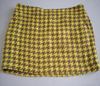 Sueter tipo over size y falda con bolsas a los lados