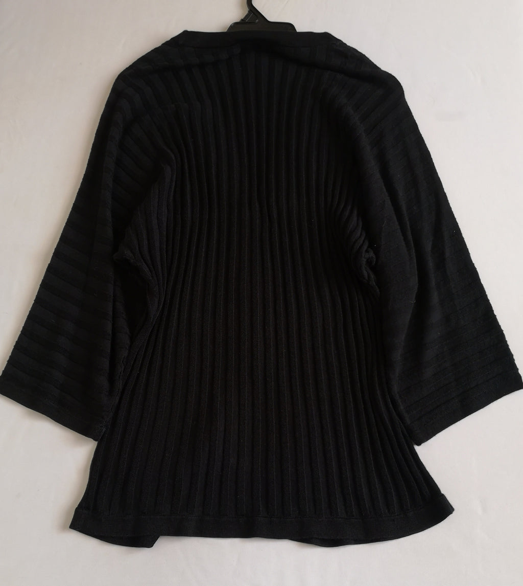 Blusa larga acanalada