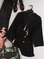 Blusa larga acanalada
