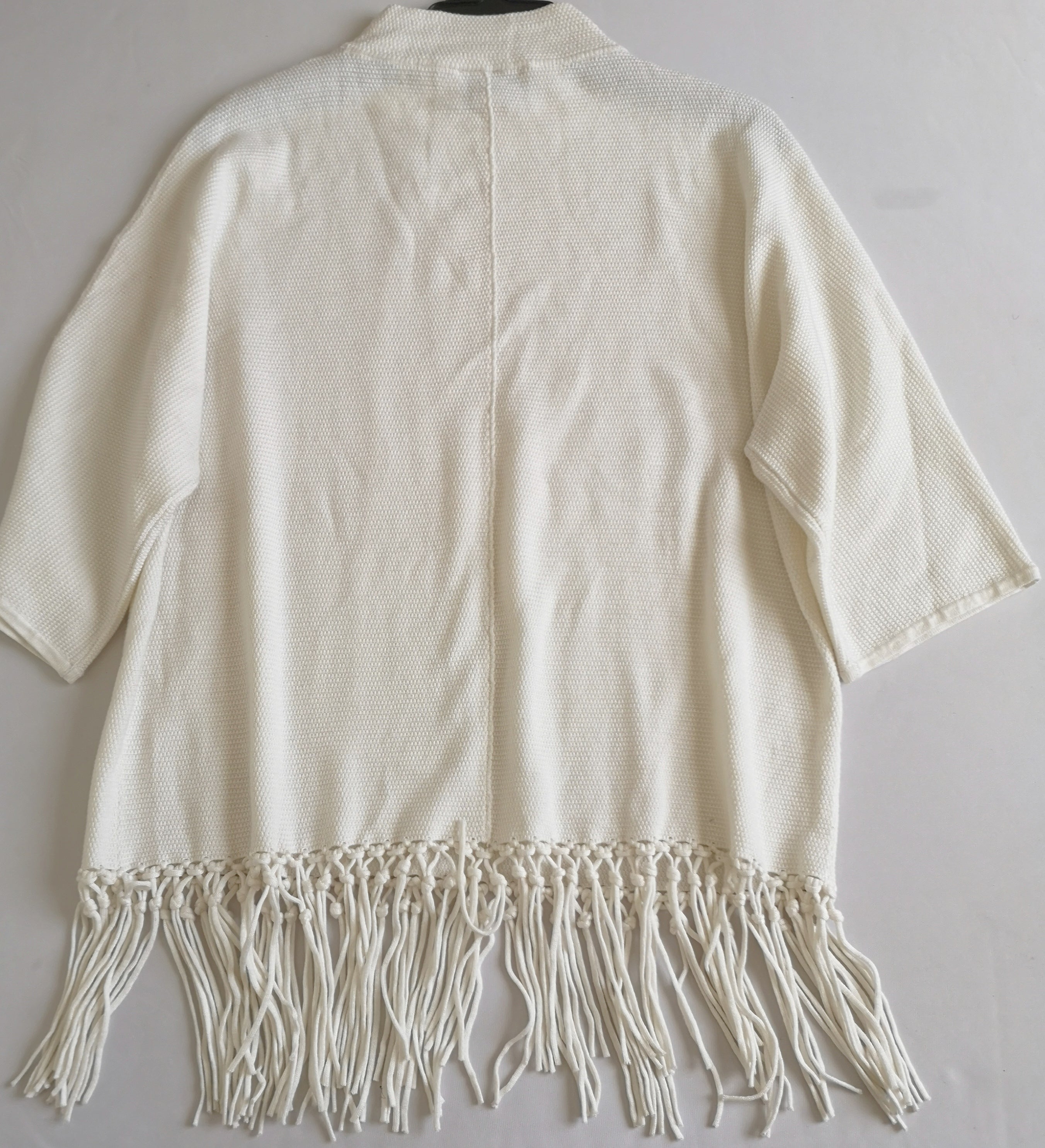 Blusa con flecos incluye collar