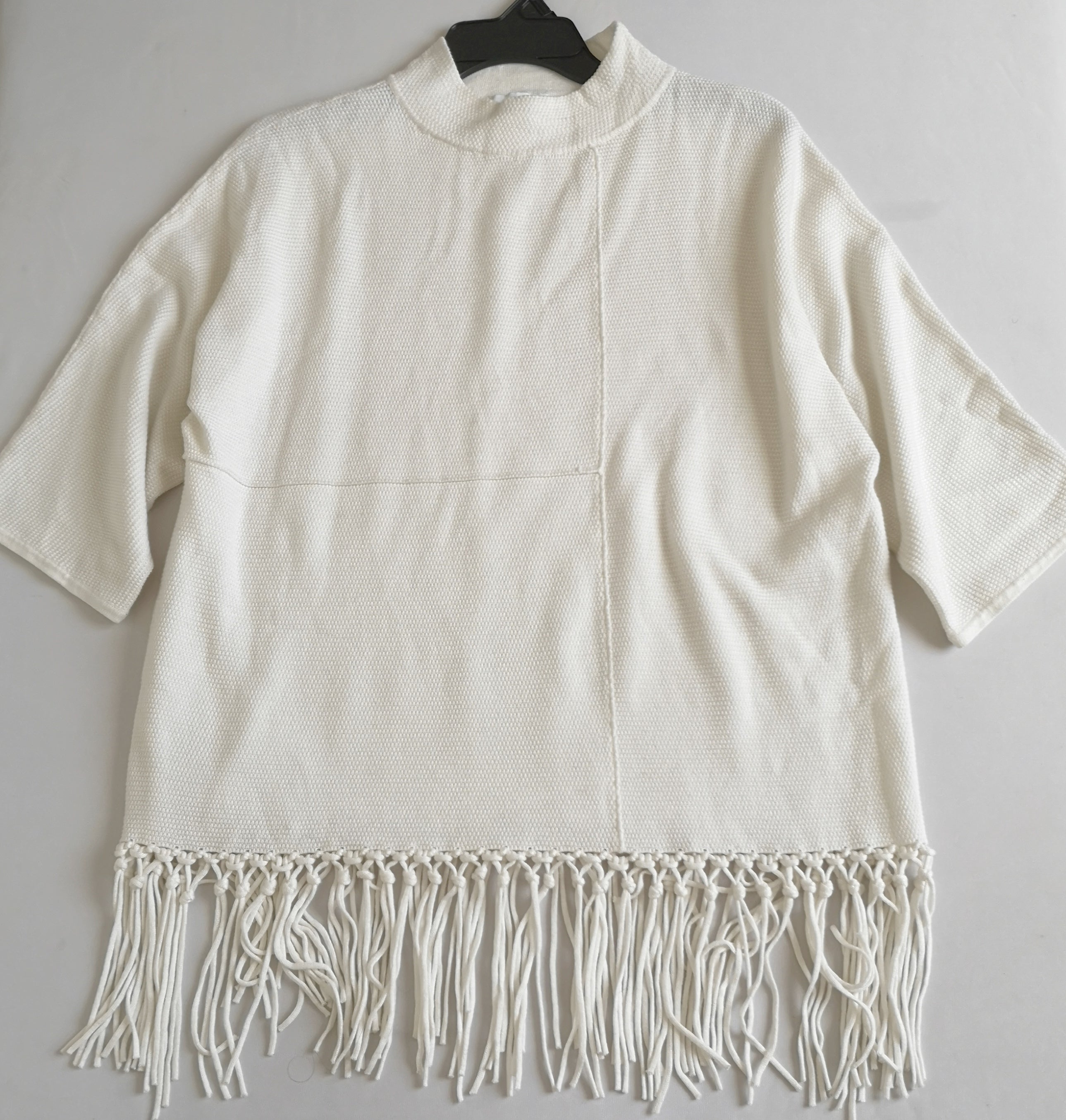 Blusa con flecos incluye collar