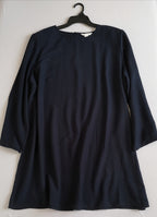 Vestido nuevo con hombreras