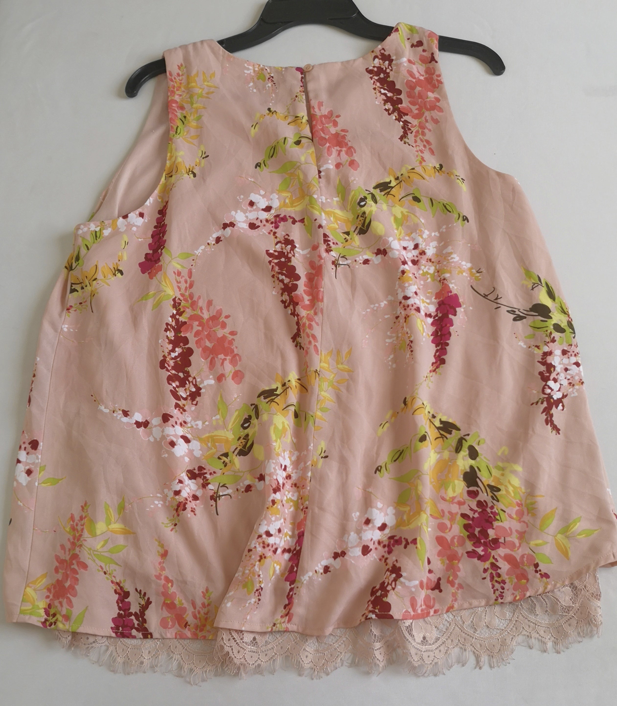 Pantalón straight leg con blusa sin mangas
