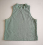 Blusa tallada y pantalón con bolsas a los lados