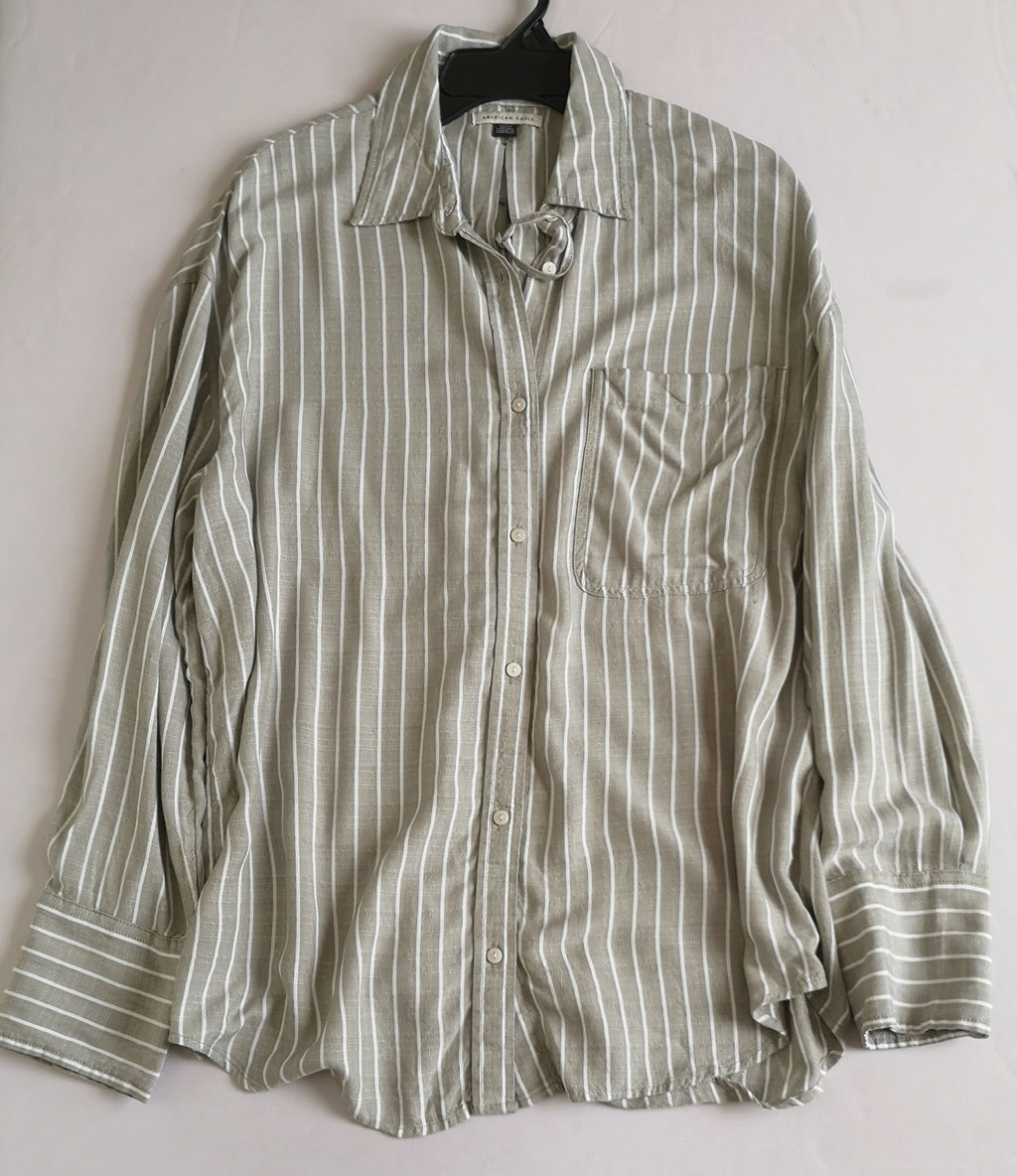 Blusa larga abierta de atrás