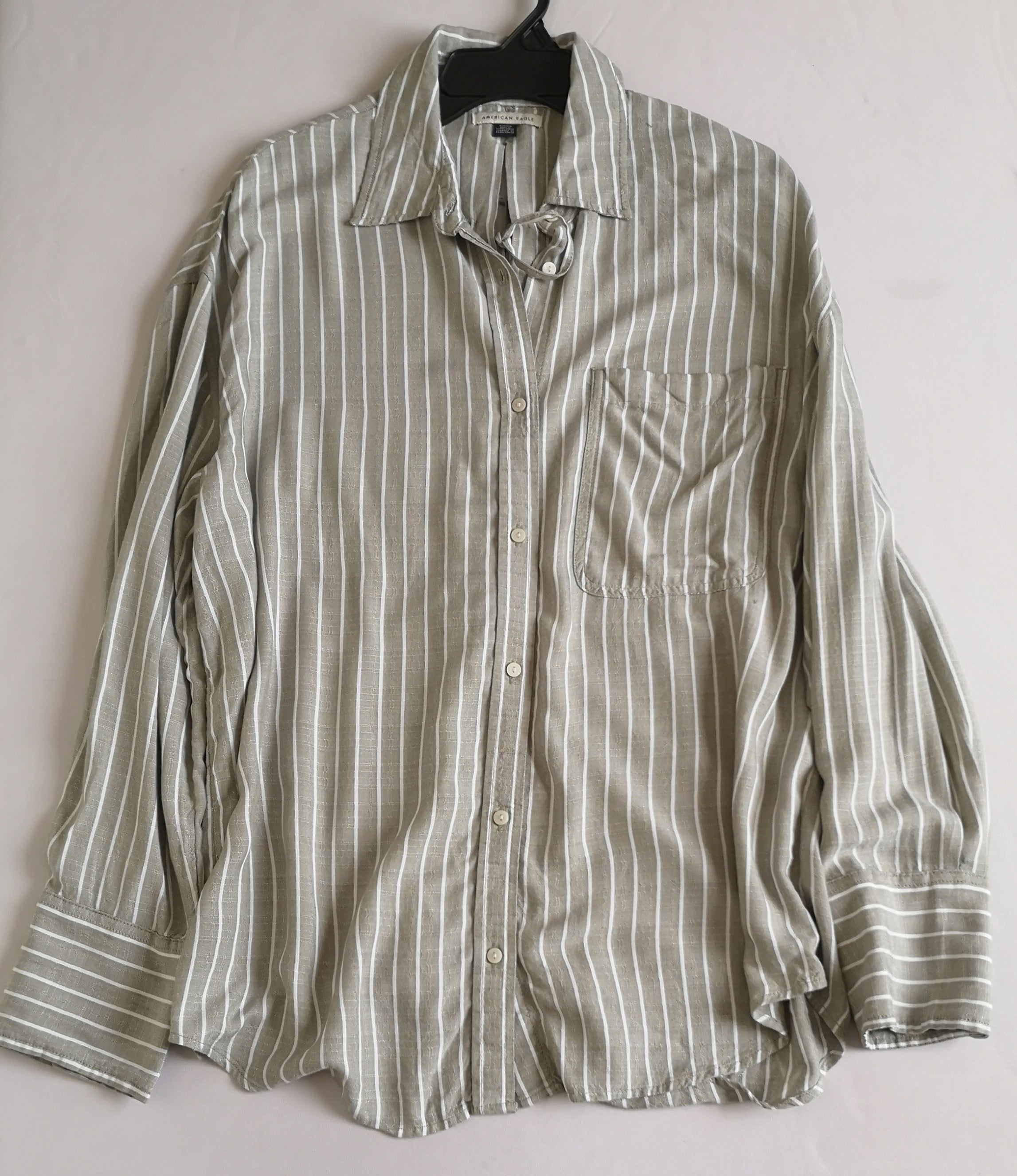 Blusa larga abierta de atrás