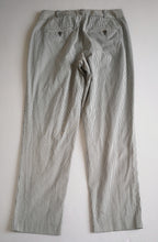 Pantalón corte recto con suéter