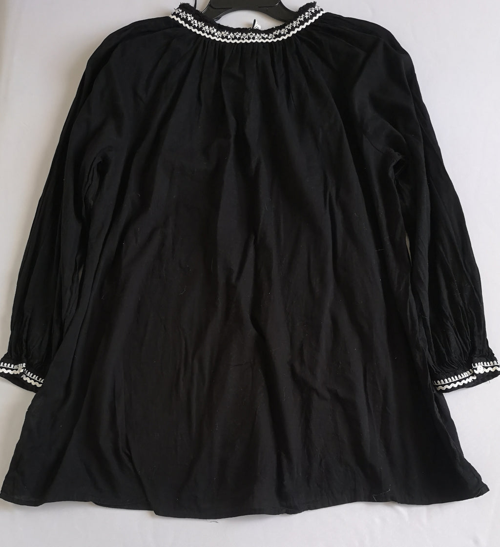 Blusa tipo túnica