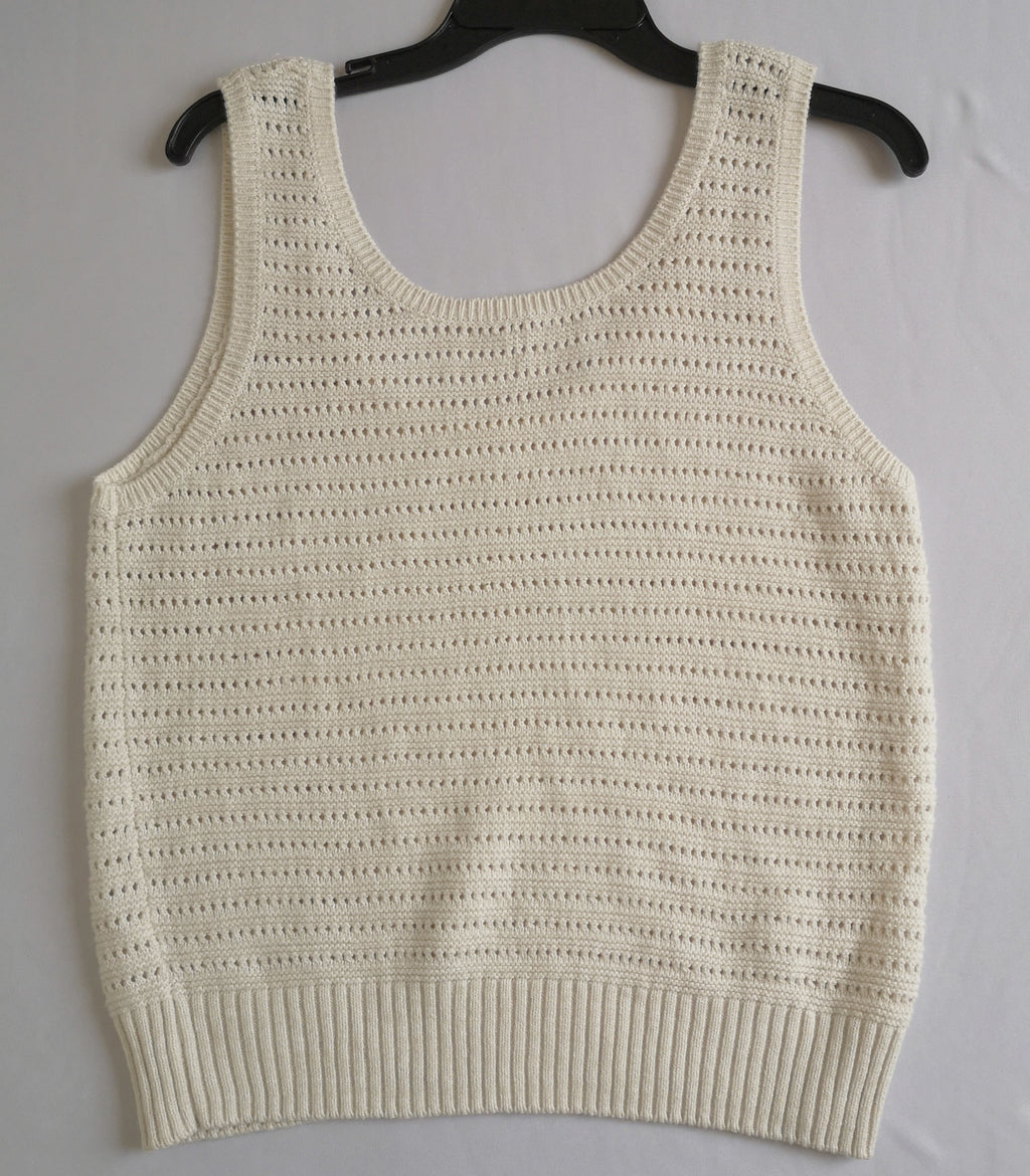 Palazzo con bolsas a los lados y blusa tejida