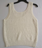 Palazzo con bolsas a los lados y blusa tejida