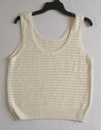 Palazzo con bolsas a los lados y blusa tejida