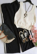 Palazzo con bolsas a los lados y blusa tejida