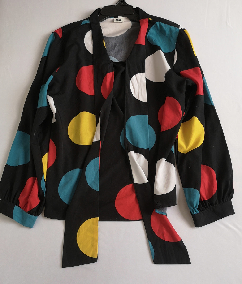 Falda asimétrica con blusa manga larga ⚓