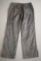 Pantalón de seda con suéter
