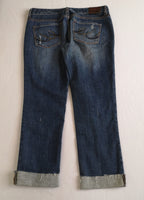Blusa holgada con jeans corte recto