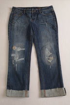Blusa holgada con jeans corte recto