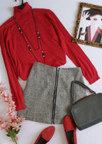 Blusa cuello alto y falda con zipper