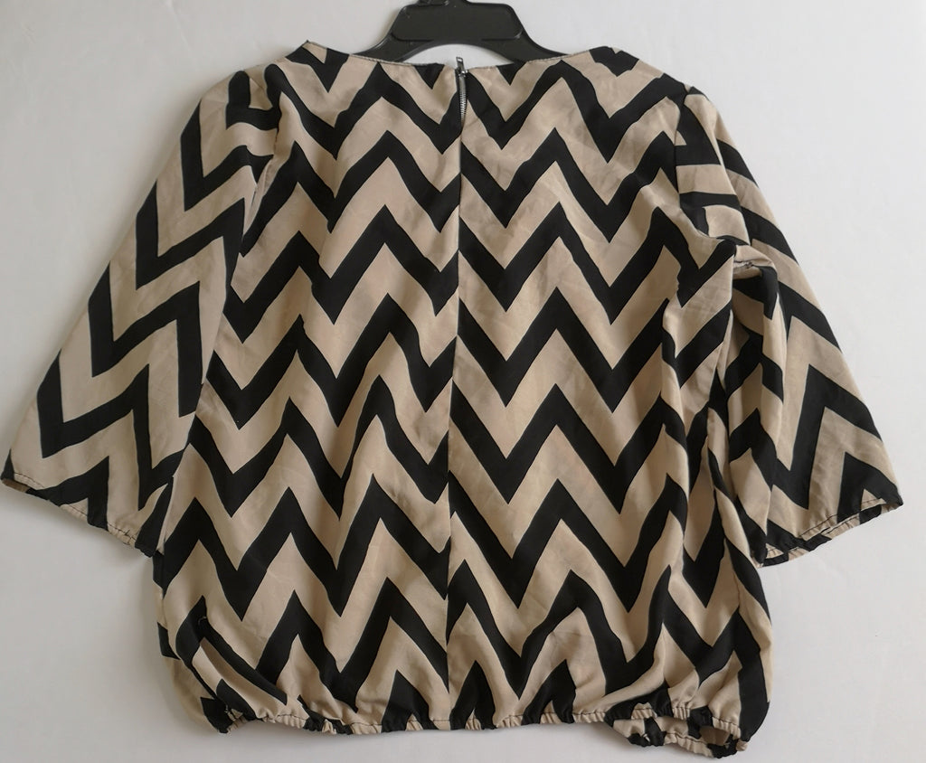 Blusa con elástico abajo