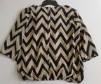 Blusa con elástico abajo