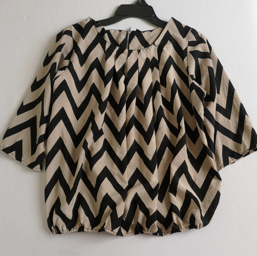 Blusa con elástico abajo