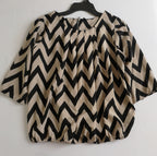Blusa con elástico abajo