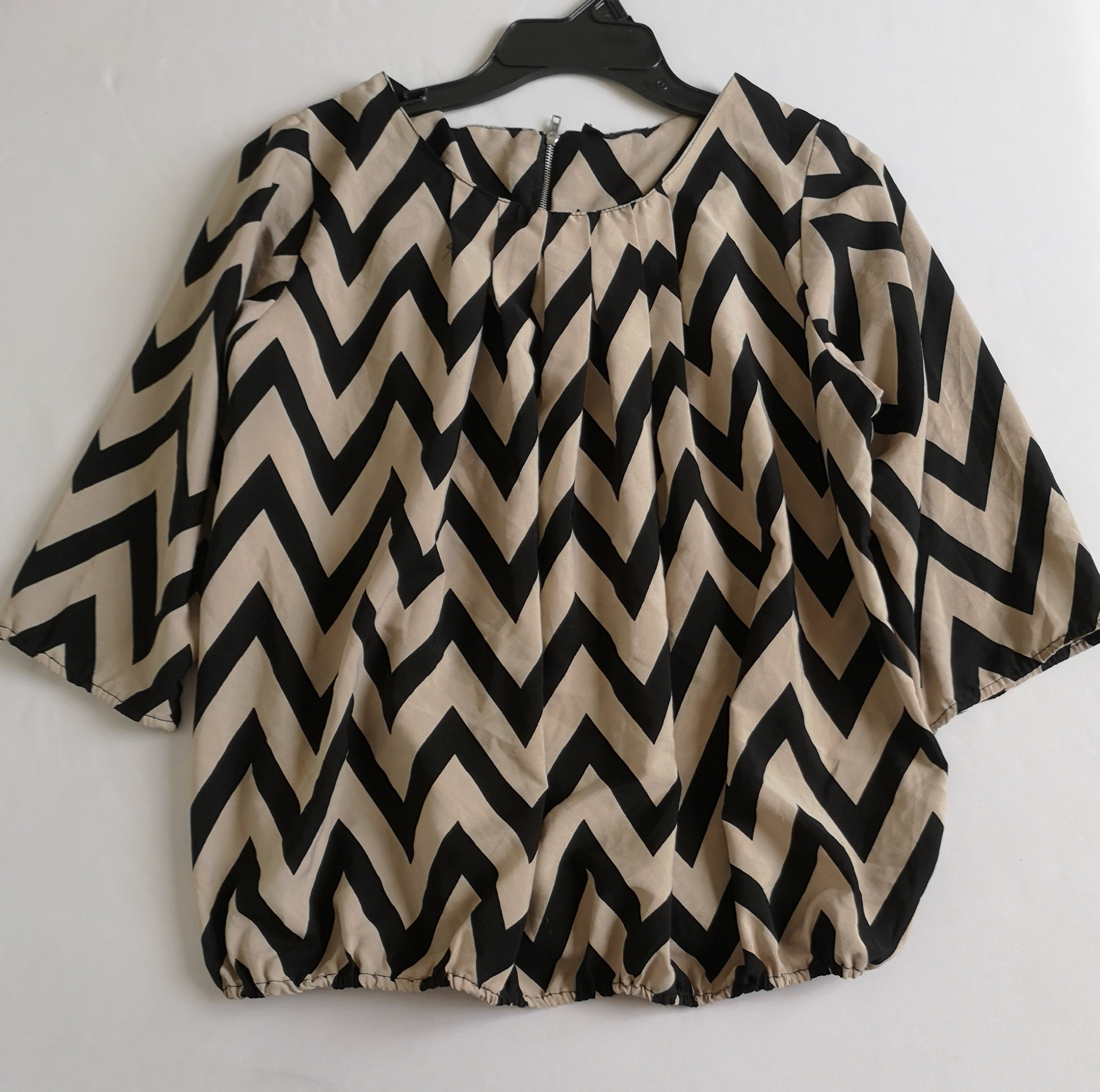 Blusa con elástico abajo