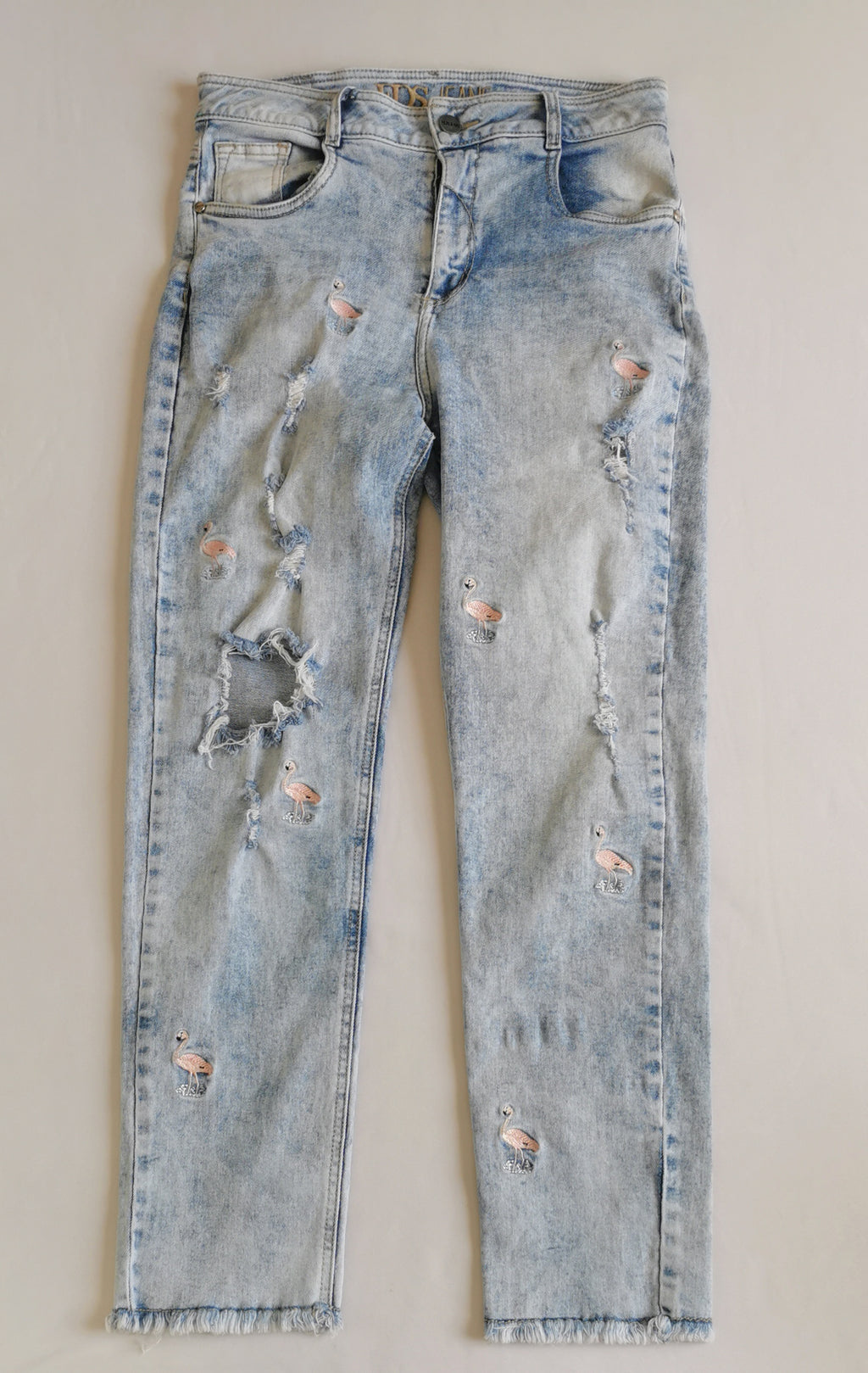 Jeans bordado con blusa