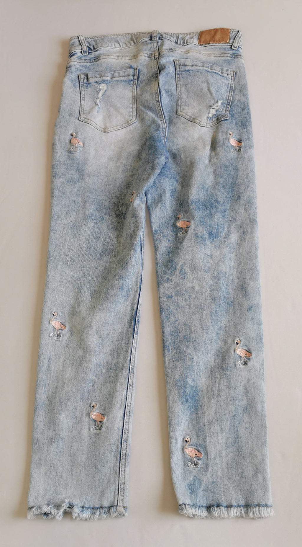 Jeans bordado con blusa
