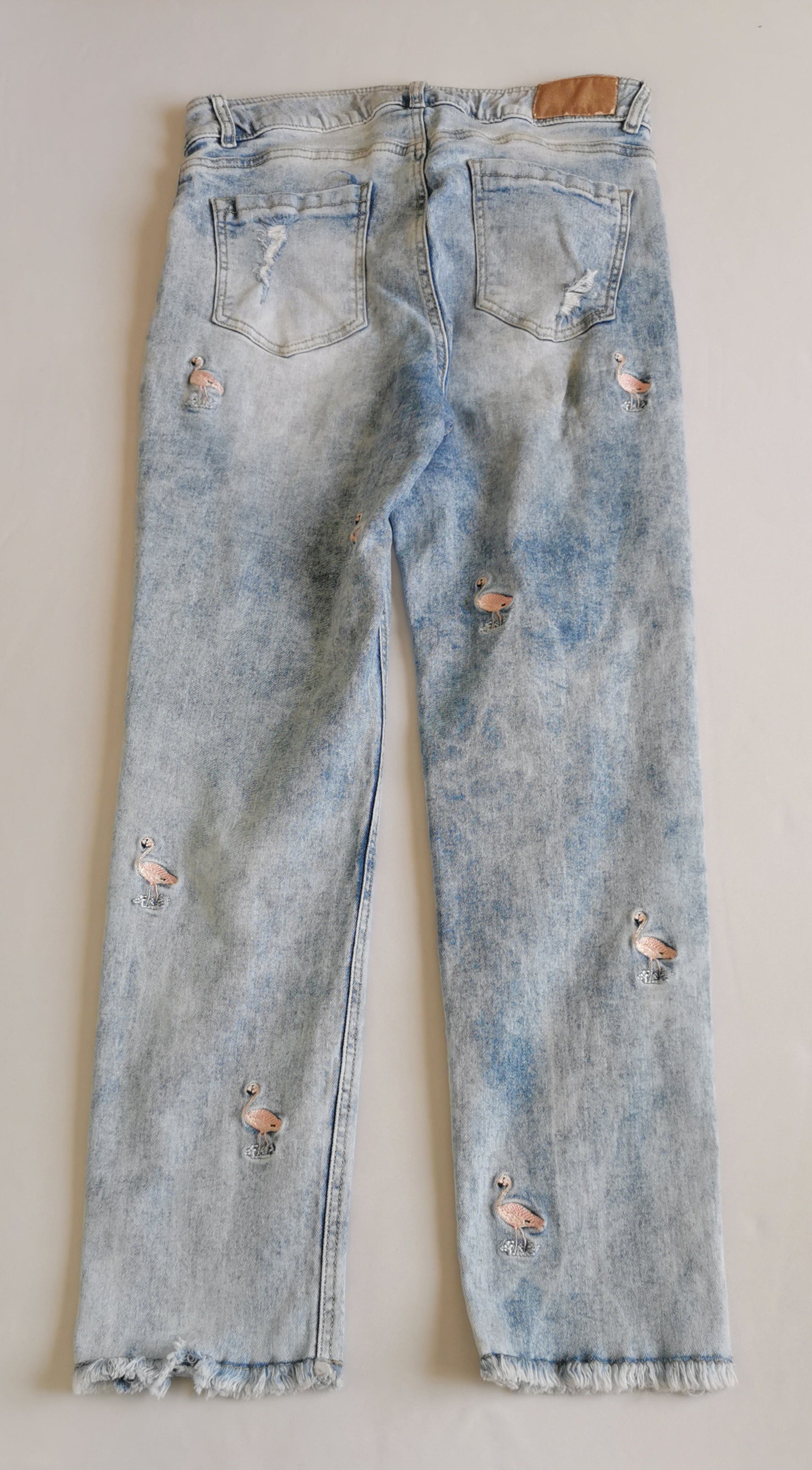 Jeans bordado con blusa