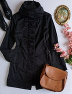Jacket tipo impermeable con gorro escondido