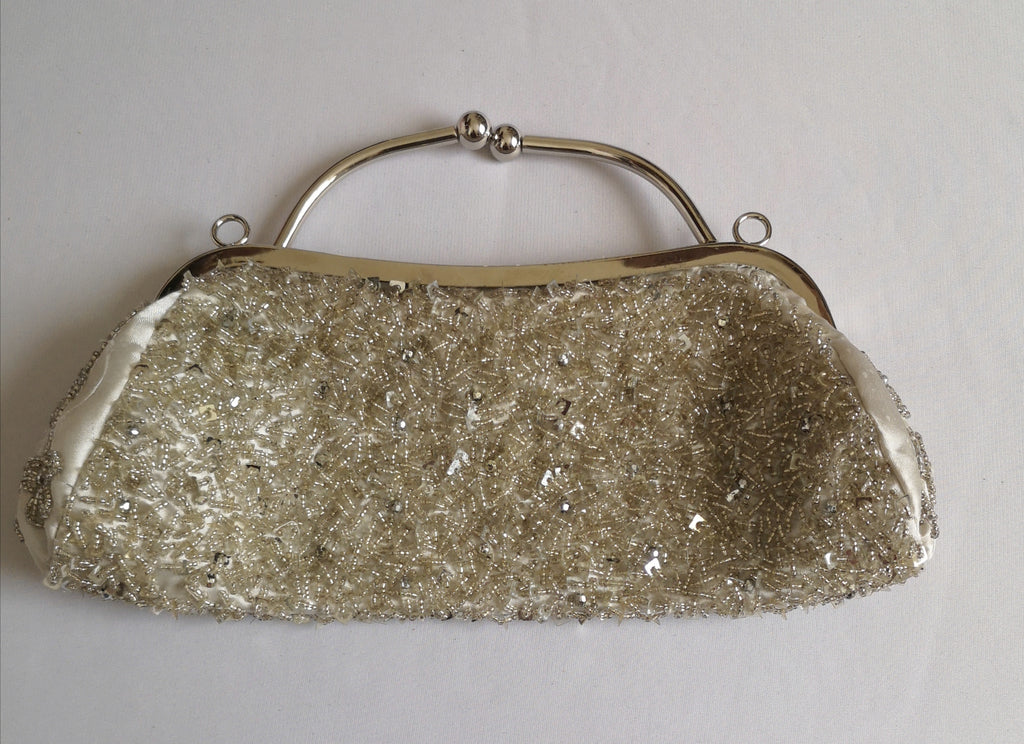 Cartera de mano bordada