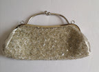Cartera de mano bordada