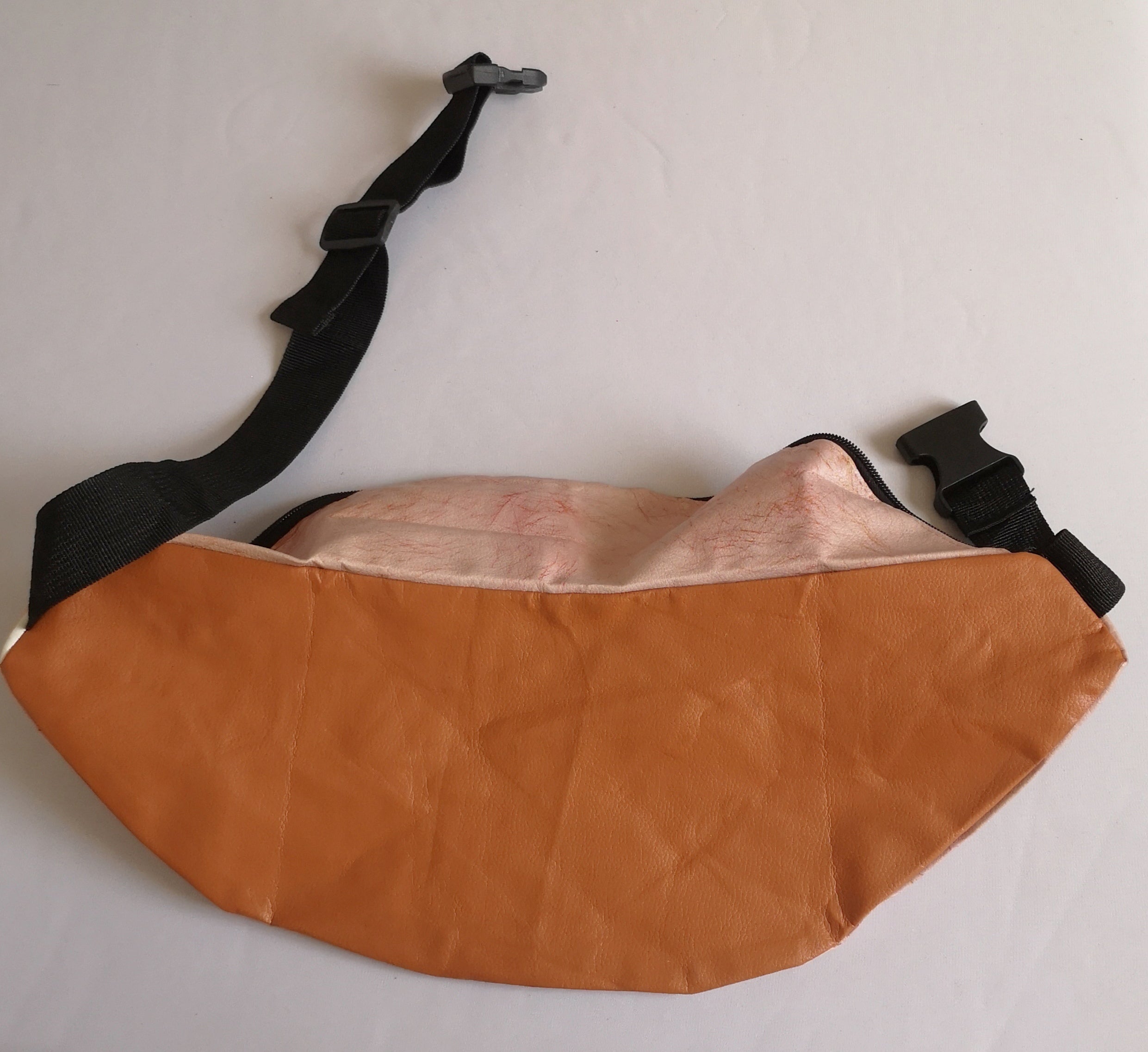 Bolsa cruzada tipo riñonera